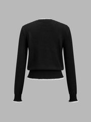Pull bord festonné fendu