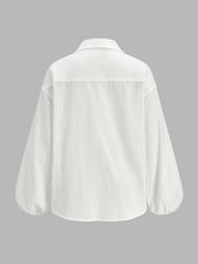 Chemise manches ballon poches doubles