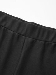 Pantalon flare court stretch noir, détail de la taille