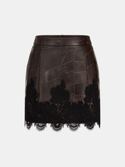 Jupe mini patchwork simili cuir bordée dentelle