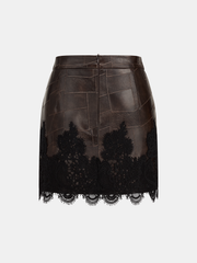 Jupe mini patchwork simili cuir bordée dentelle