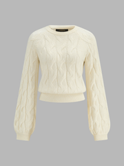 Pull torsadé col rond