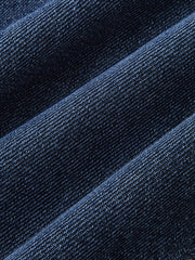 Jean large à boutons marine, détail