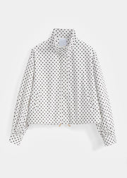 Veste zippée à pois — vue de face sur fond neutre.