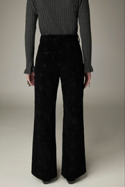 Pantalon noir à jambe évasée