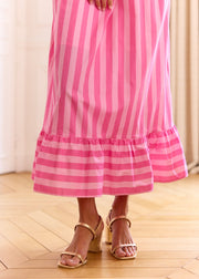 Robe longue rayée fuchsia col bardot