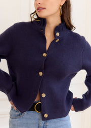 Gilet marine col montant volanté — vue portée de face