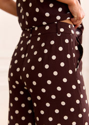 Pantalon chocolat à pois blancs