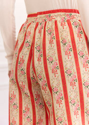 Pantalon corail rayé fleuri