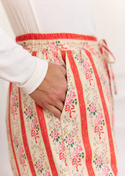 Pantalon corail rayé fleuri