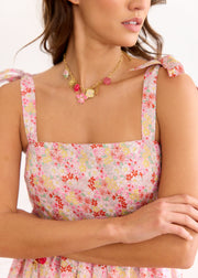 Robe fleurie rose nouée aux épaules