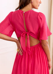 Robe fuchsia cache-cœur dos ouvert