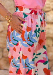 Pantalon fleuri fuchsia lien taille