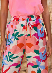 Pantalon fleuri fuchsia lien taille