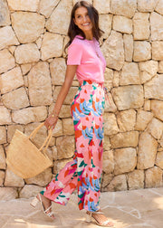 Pantalon fleuri fuchsia lien taille