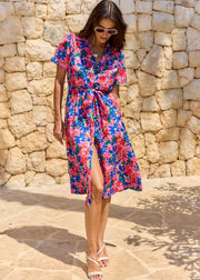 Robe midi fleurie bleu rose ceinturée