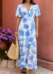 Robe longue fleurie bleue cintrée