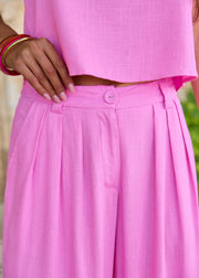 Pantalon fuchsia en lin à pinces