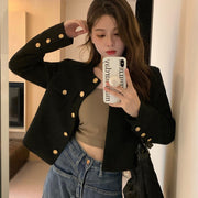 Veste Bérénice pour femme noir — vue portée de face, pose en intérieur