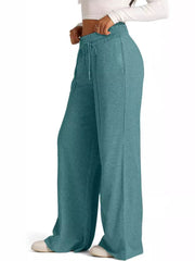 Pantalon de jogging à jambe large Apolline vert paon, vue portée de trois quarts