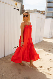 Robe fluide à col carré portée par une femme, vue de face, cabine, lunettes