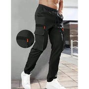 Pantalon cargo poches rabat noir — vue portée de profil, poche cargo