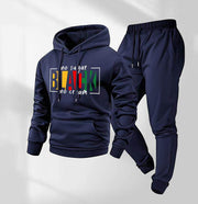 Ensemble veste capuche pantalon — bleu marine présenté à plat de face, imprimé texte multicolore
