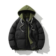 Veste à capuche effet superposé — doudoune noire matelassée, capuche kaki superposée