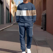 Ensemble sweat patchwork et jogging bleu marine — vue portée en pied