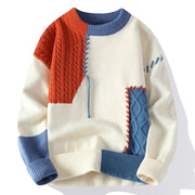 Pull à col rond écru, bleu et orange, présenté de face.