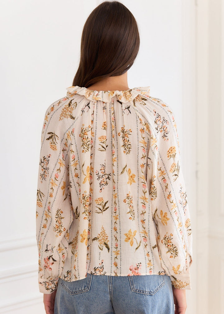 Blouse ivoire fleurie fluide nœud col