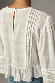 Blouse courte fluide — vue de dos, ouverture au col