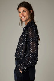 Blouse à volants et col officier