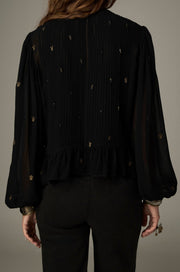 Blouse noire à pois brodés — vue de dos, tombé du tissu