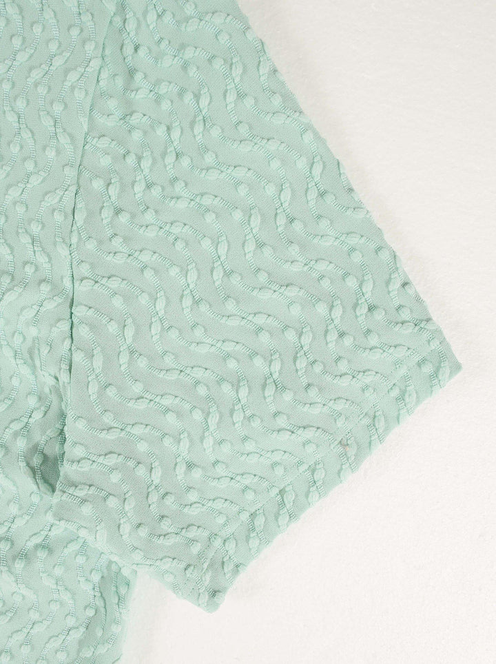 Chemise unie à manches courtes — vue complémentaire du produit.
