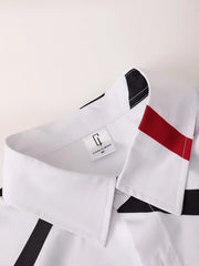 Ensemble polo short taille élastique — gros plan col et motifs ondulés noir et rouge