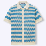 Polo maille ajourée ondulée turquoise et blanc — vue à plat, de face