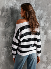 Pull rayé noir et blanc — vue portée de dos, rayures et dos échancré