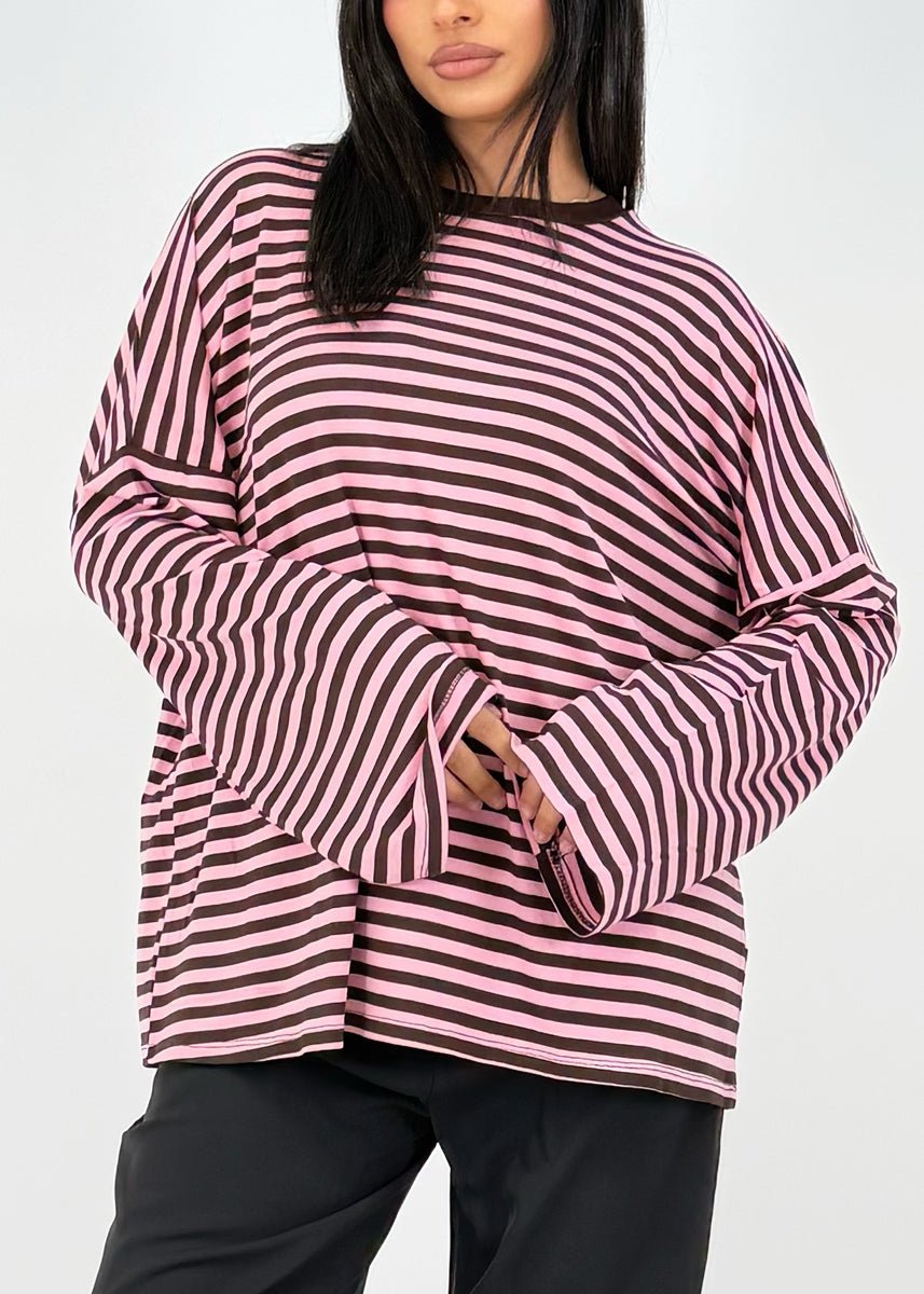 T-shirt manches longues rayé — vue portée de face, cadrée à la taille, manches larges
