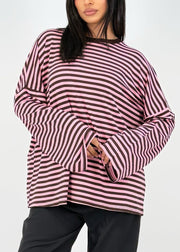 T-shirt manches longues rayé — vue portée de face, cadrée à la taille, manches larges