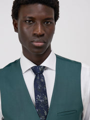 Gilet de costume vert bouteille — gros plan haut du gilet et cravate