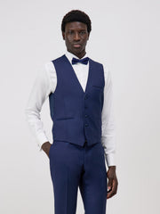 Gilet de smoking bleu indigo — vue portée de face, avec nœud papillon