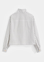 Veste zippée à pois — vue de dos sur fond neutre.