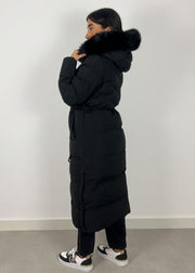 Parka longue noire à capuche — vue de dos.