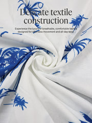 Ensemble chemise cocotier et short — gros plan du tissu blanc imprimé cocotiers bleus