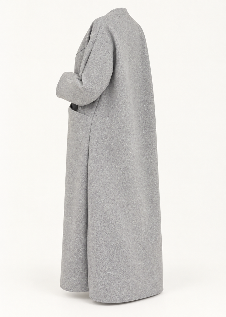 Manteau oversize gris, vue trois quarts dos de la pièce isolée