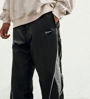 Pantalon cordon bandes latérales — vue de trois-quarts, de la taille aux tibias