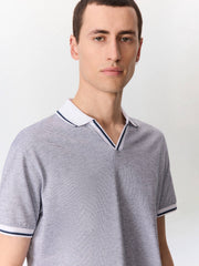 Polo classique maille bleu marine — vue portée de trois-quarts