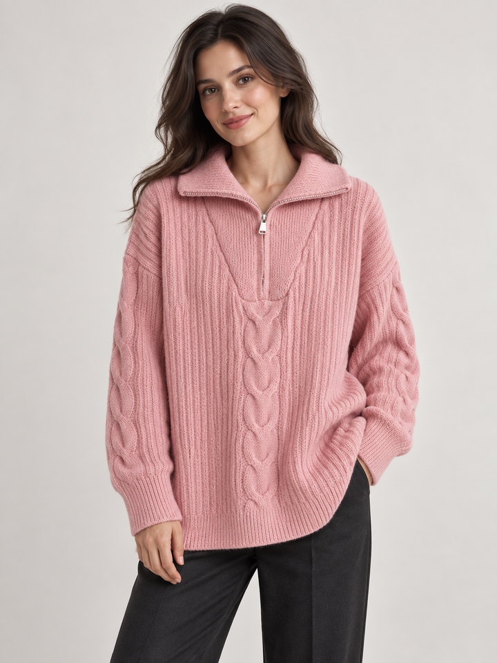 Mulher com pulôver rosa de trança central e gola com fecho, vista frontal