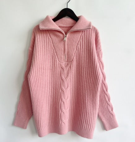Pull rose torsadé col zippé
